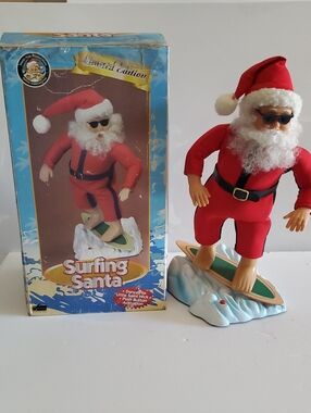 Surfing Santa Holiday Figurine - Red